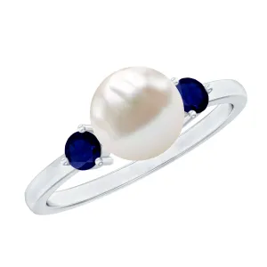 Freshwater Pearl Solitaire Engagement Ring with Blue Sapphire