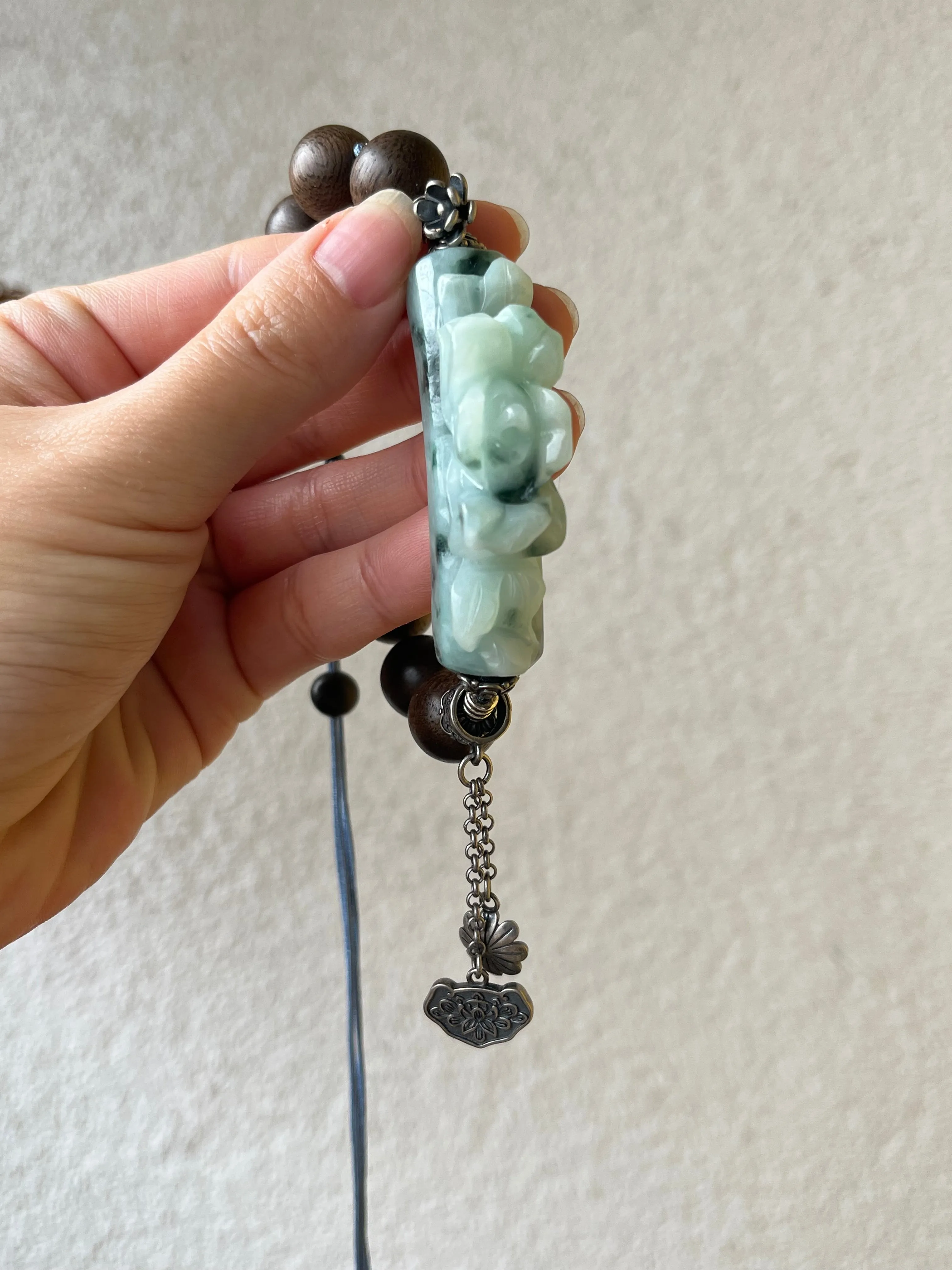 Handwoven Bracelet with a Hand Carved Jadeite Peony Flower and 12mmm Agarwood Beads, 手编沉香翡翠牡丹手牌