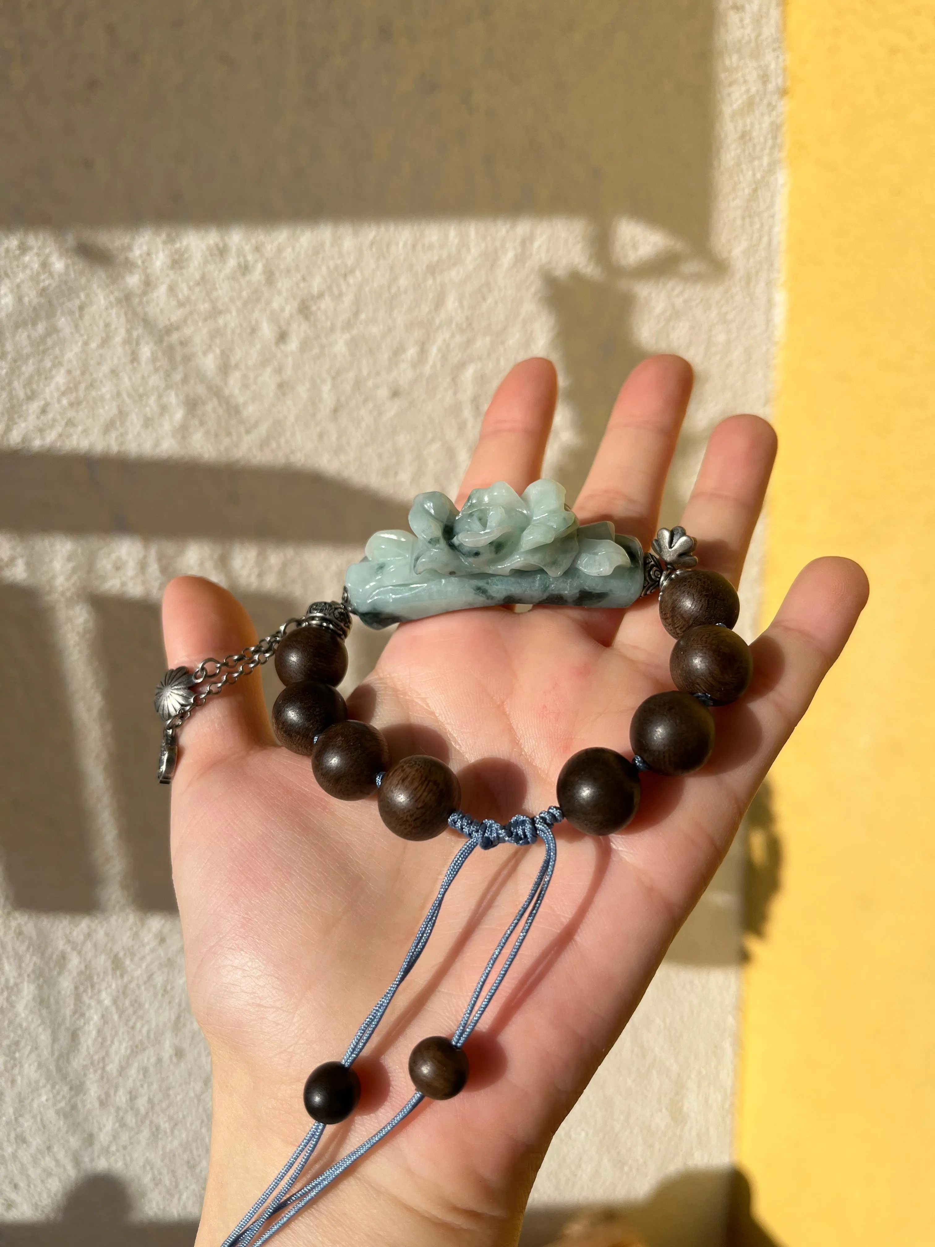 Handwoven Bracelet with a Hand Carved Jadeite Peony Flower and 12mmm Agarwood Beads, 手编沉香翡翠牡丹手牌