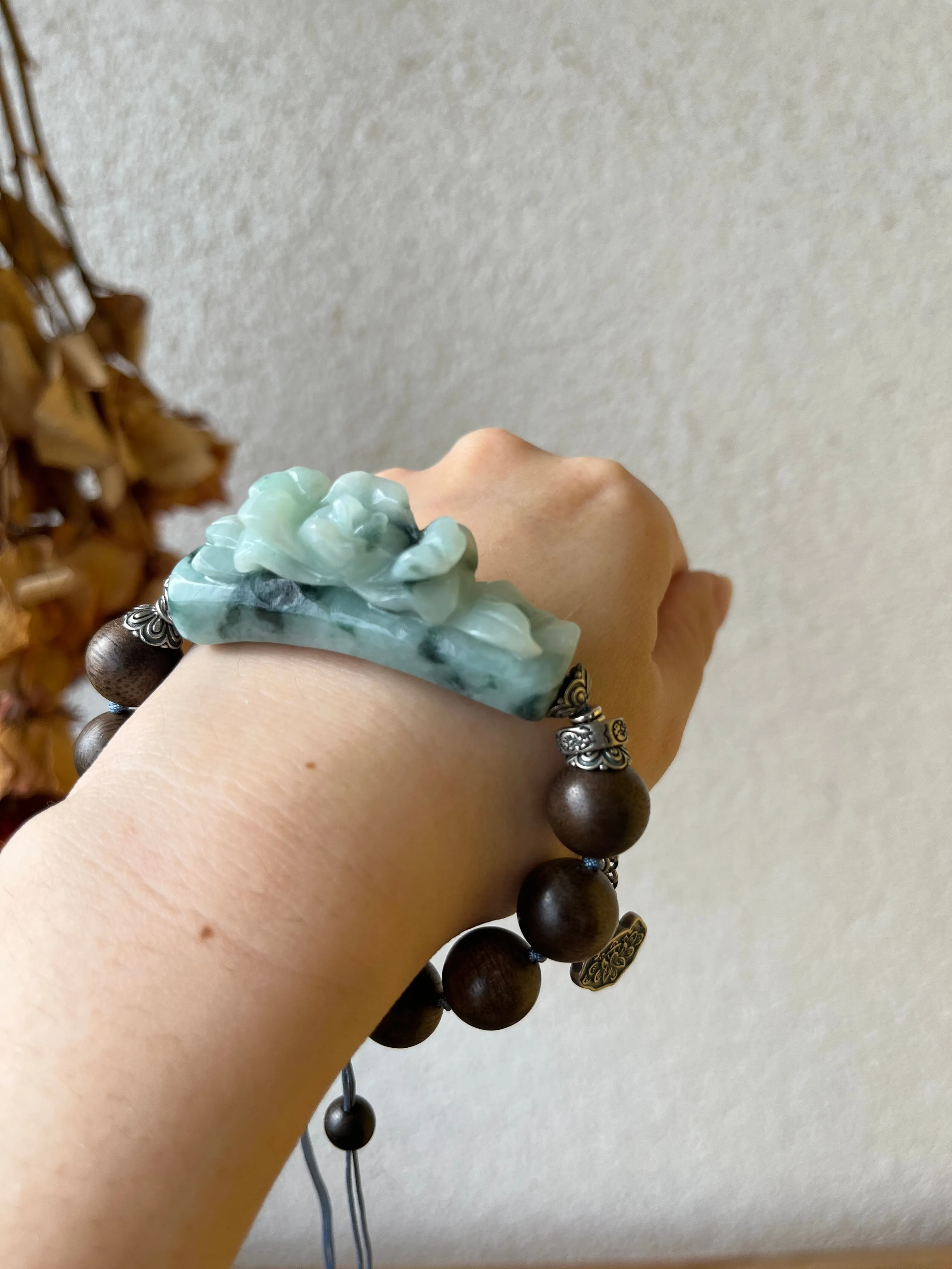 Handwoven Bracelet with a Hand Carved Jadeite Peony Flower and 12mmm Agarwood Beads, 手编沉香翡翠牡丹手牌