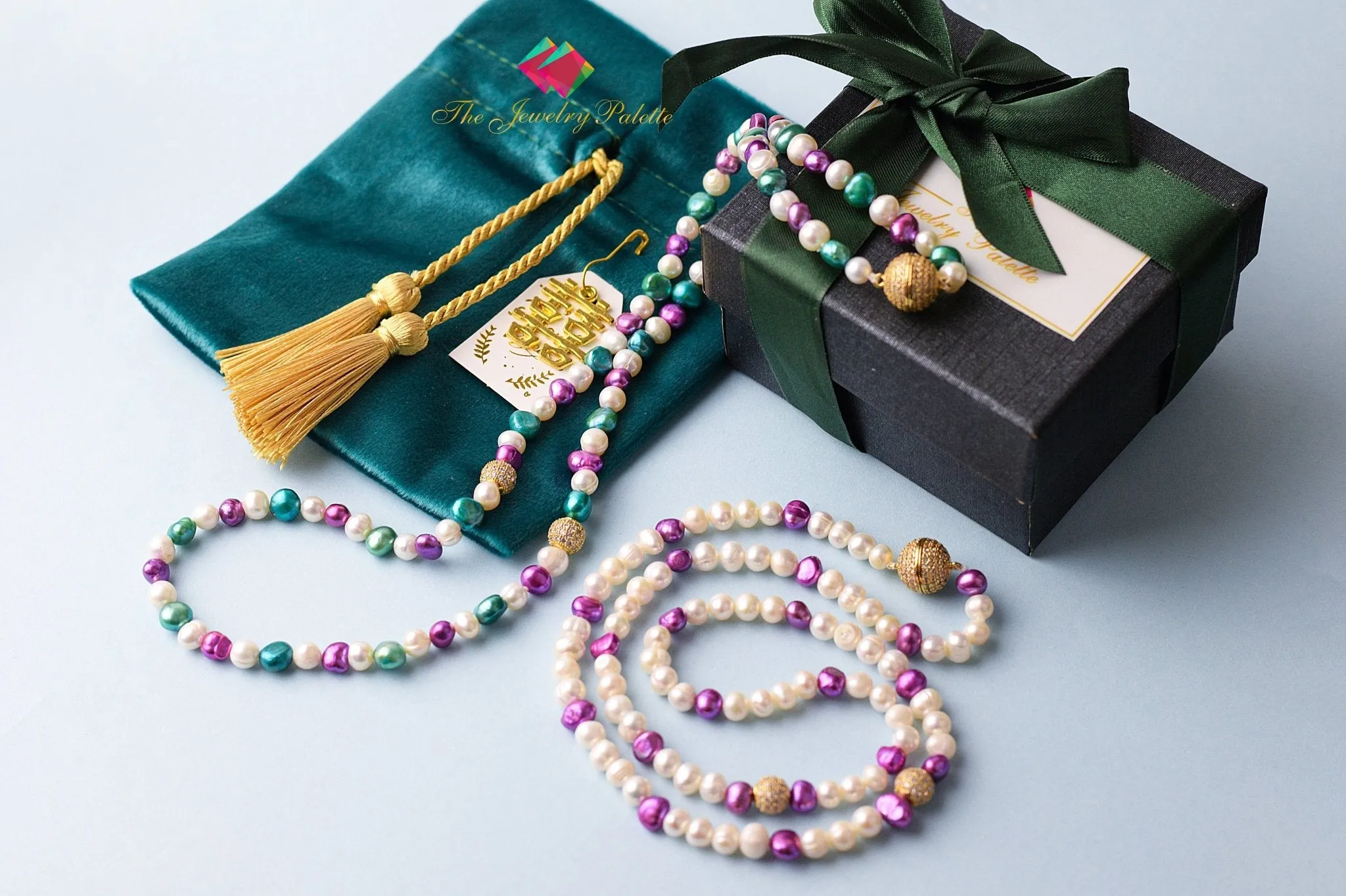 White and purple pearls tasbeeh (rosary)