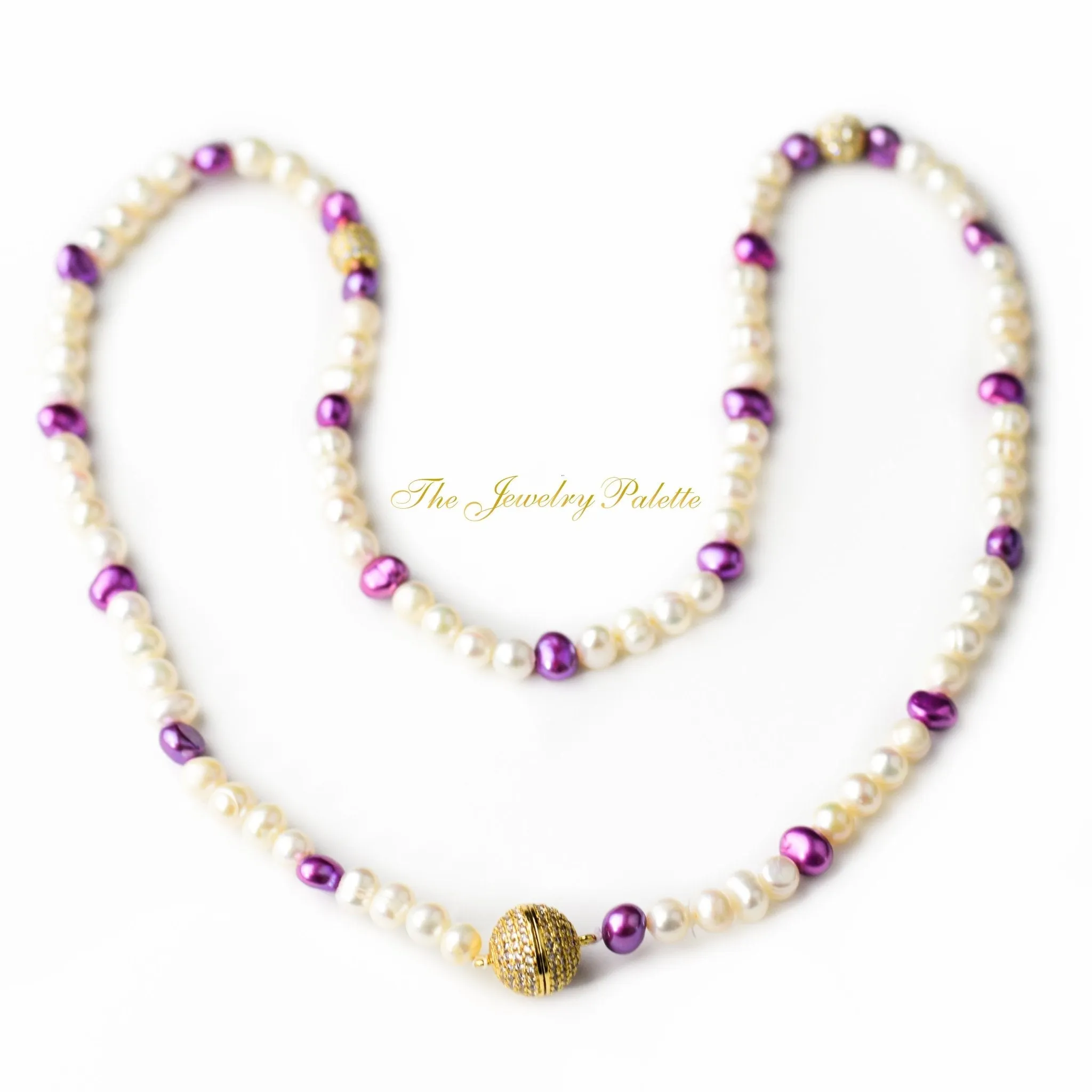 White and purple pearls tasbeeh (rosary)